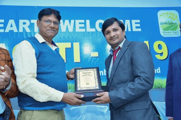 Mr Kiran Kumar receiving the award